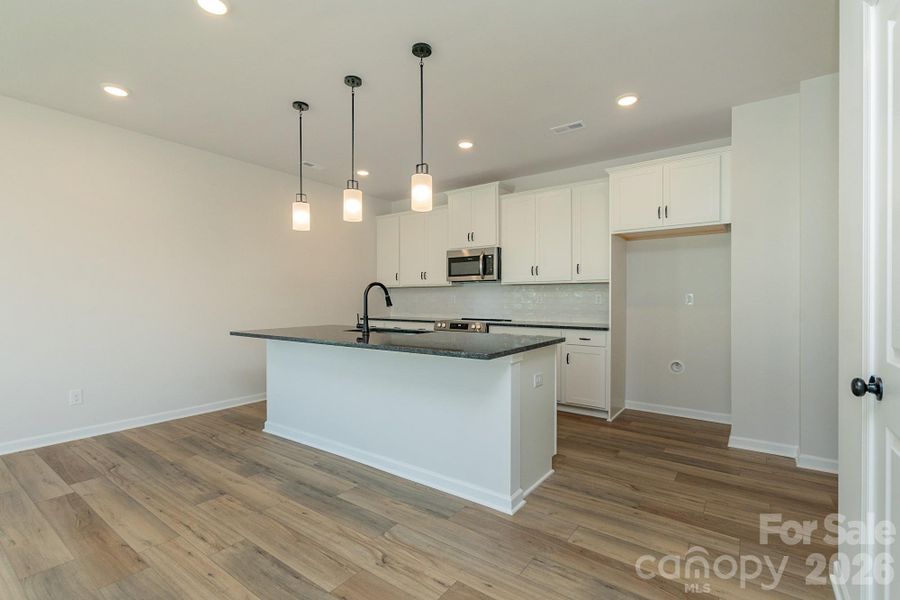 Furnished interior view inside a new home in Sunset Meadows, Charlotte (Image 3).