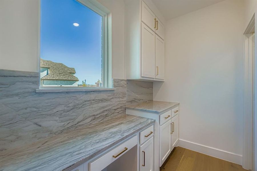 Furnished interior view inside a new home in Star Trail - 55s, Prosper (Image 5).