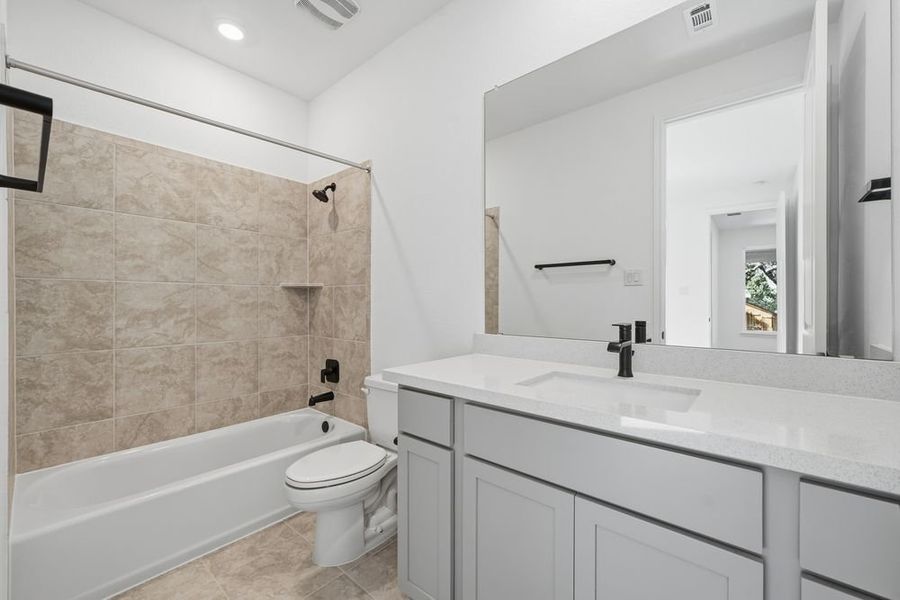 Furnished interior view inside a new home in Parkside on the River, Georgetown (Image 11).