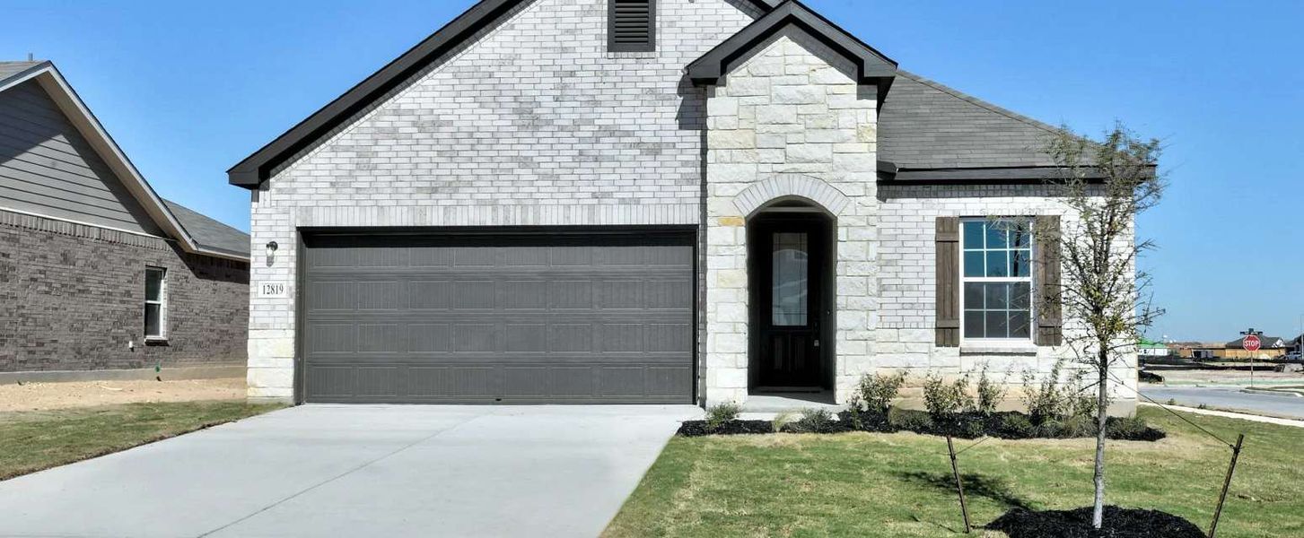 Representative exterior photo of a completed home built from the Hadley by Ashton Woods in Enclave at Hennersby Hollow 50's, San Antonio, TX (Image 2). Representative exterior photo of a completed home built from the Hadley by Ashton Woods in Enclave at Hennersby Hollow 50's, San Antonio, TX (Image 2).