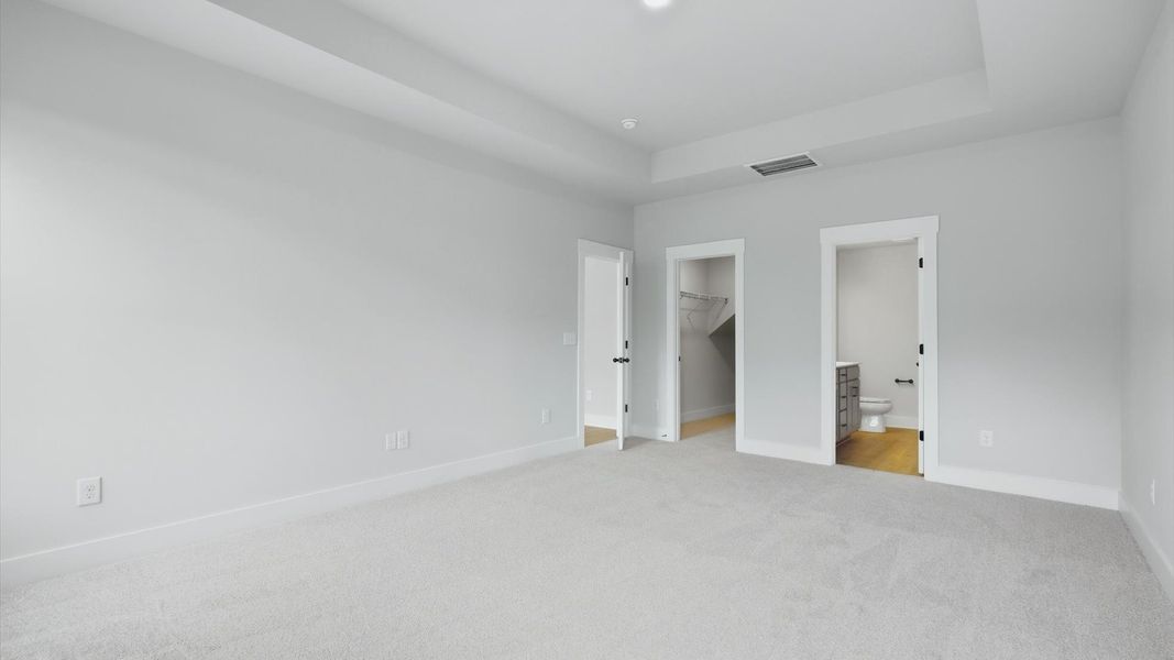 Highly skilled design shines in this elegant, restful primary suite near Downtown Anderson