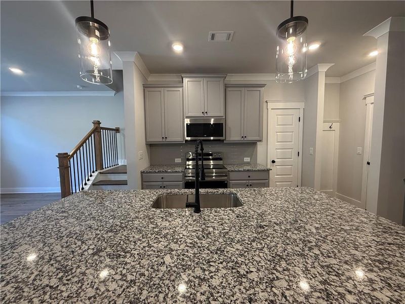Furnished interior view inside a new home in The Towns at Auburn Station East, Auburn (Image 6).