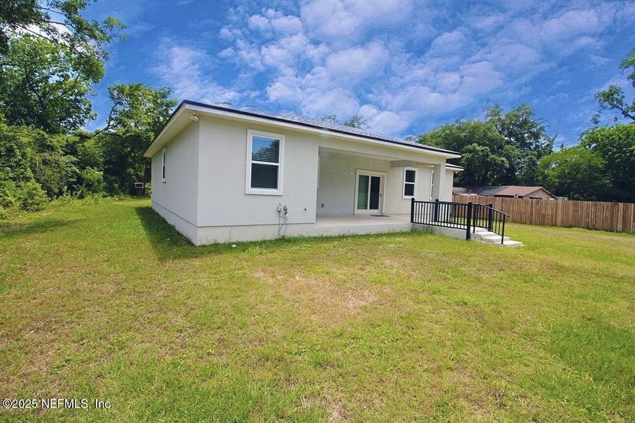 Front exterior of a new home in , Jacksonville, FL, highlighting curb appeal (Image 18).