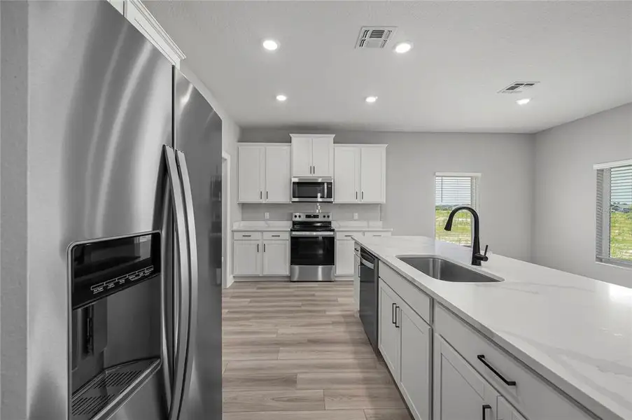 Furnished interior view inside a new home in Gum Lake Preserve, Lake Alfred (Image 6).
