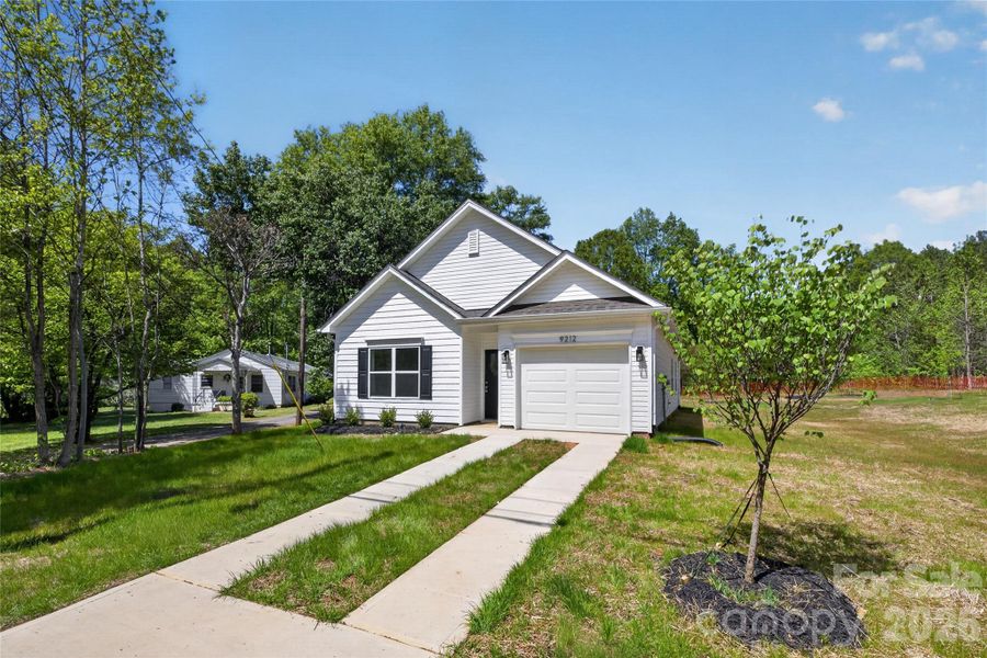 Front exterior of a new home in , Charlotte, NC, highlighting curb appeal (Image 2). Front exterior of a new home in , Charlotte, NC, highlighting curb appeal (Image 2).