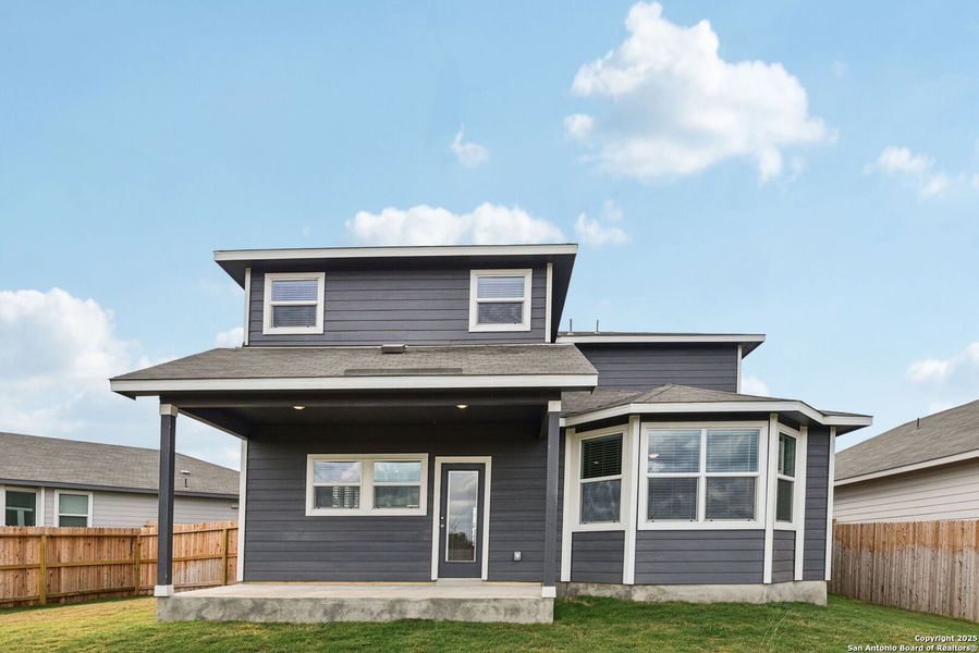 Exterior details and patio area of a home in Estancia Ranch - Premier Series, San Antonio (Image 4). Exterior details and patio area of a home in Estancia Ranch - Premier Series, San Antonio (Image 4).