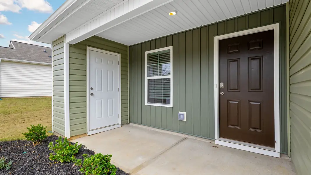 Exterior details and patio area of a home in Lake Terrace, LaFayette (Image 3). Exterior details and patio area of a home in Lake Terrace, LaFayette (Image 3).