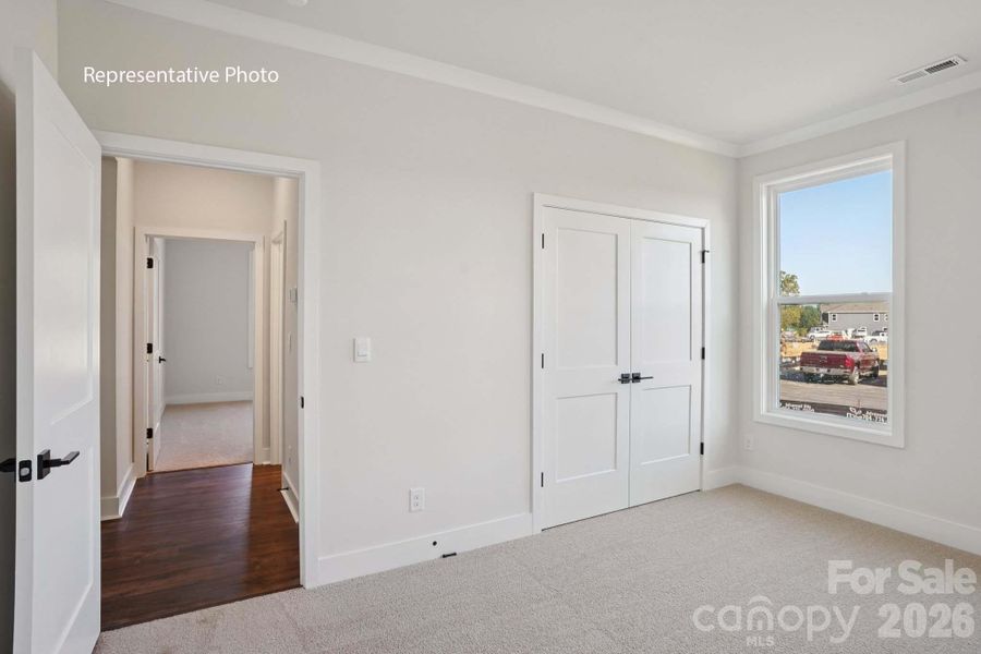 Spacious, unfurnished interior of a new home in Sanctuary at Southgate, Indian Trail (Image 36).