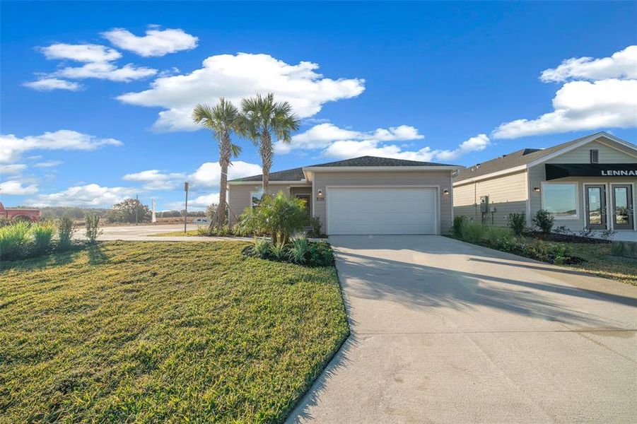 Front exterior of a new home in Pioneer Ranch, Ocala, FL, highlighting curb appeal (Image 6).