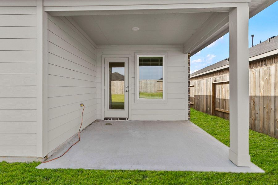 Exterior details and patio area of a home in , Splendora (Image 17).