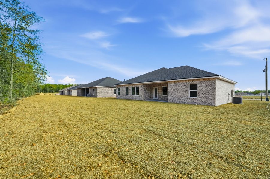 Exterior details and patio area of a home in Southern Charm, Crestview (Image 25).