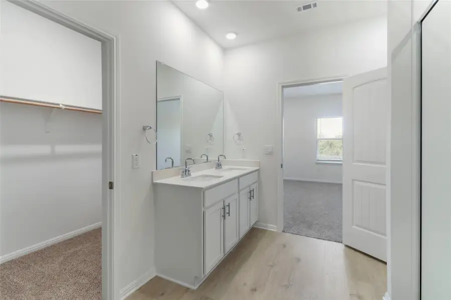 Furnished interior view inside a new home in Bar W Ranch, Leander (Image 4). Furnished interior view inside a new home in Bar W Ranch, Leander (Image 4).