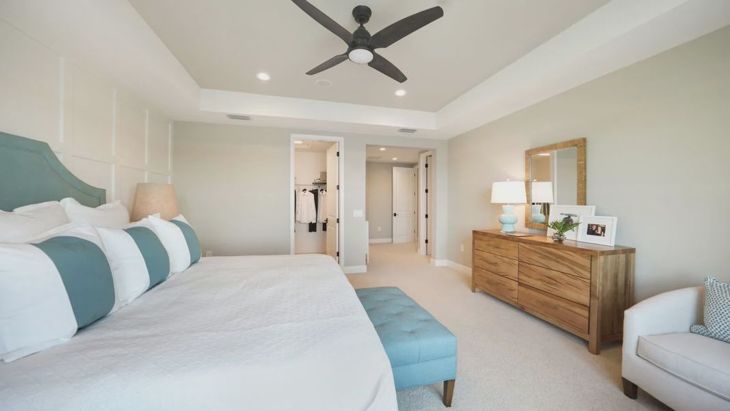 Representative furnished interior of a home built from the Artistry by Neal Communities in SkySail, Naples (Image 10).