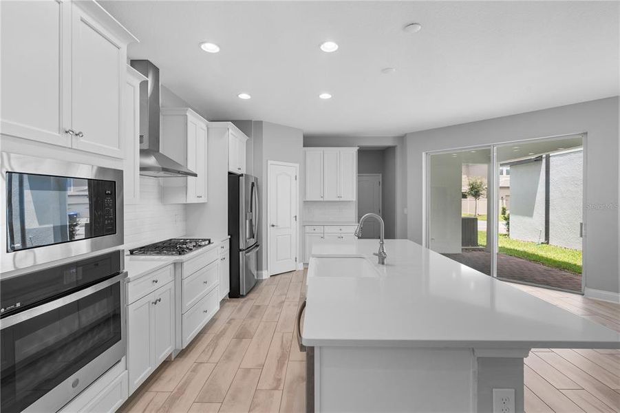 Furnished interior view inside a new home in Encore at Ovation, Winter Garden (Image 3).