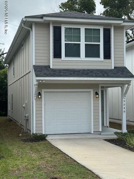 Front exterior of a new home in , Jacksonville, FL, highlighting curb appeal (Image 2).