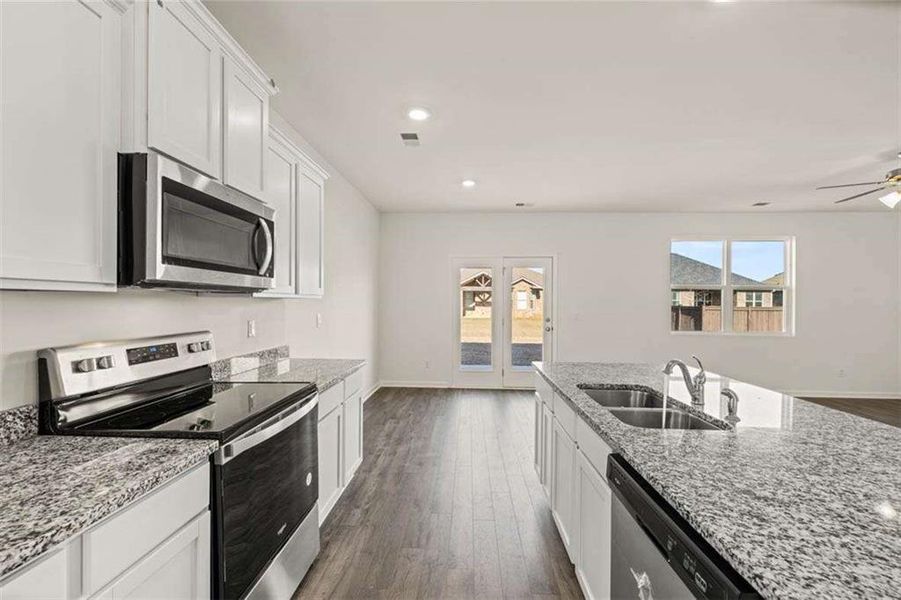 Furnished interior view inside a new home in Oakchase at Hampton, Hampton (Image 7).