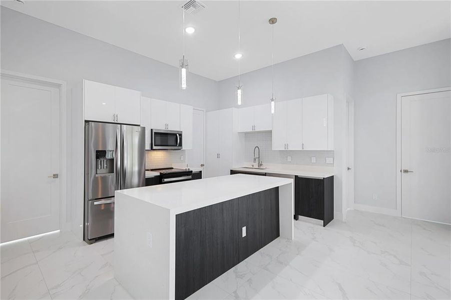 Furnished interior view inside a new home in , Port Charlotte (Image 10). Furnished interior view inside a new home in , Port Charlotte (Image 10).