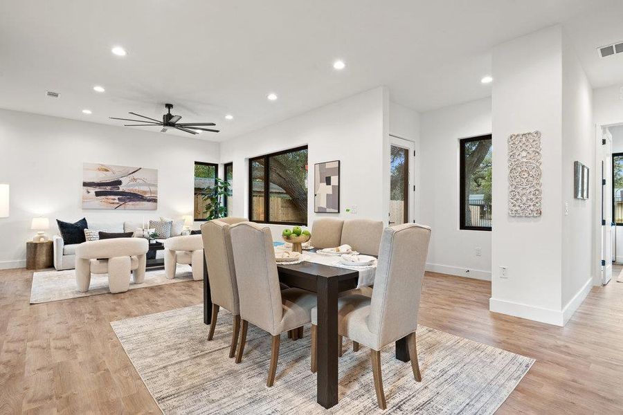 Dining room featuring recessed lighting, ceiling fan, and light wood-type flooring