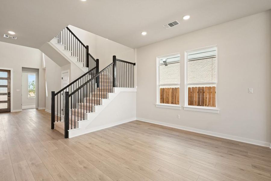 Spacious, unfurnished interior of a new home in Arbor Collection at Heritage, Dripping Springs (Image 18).