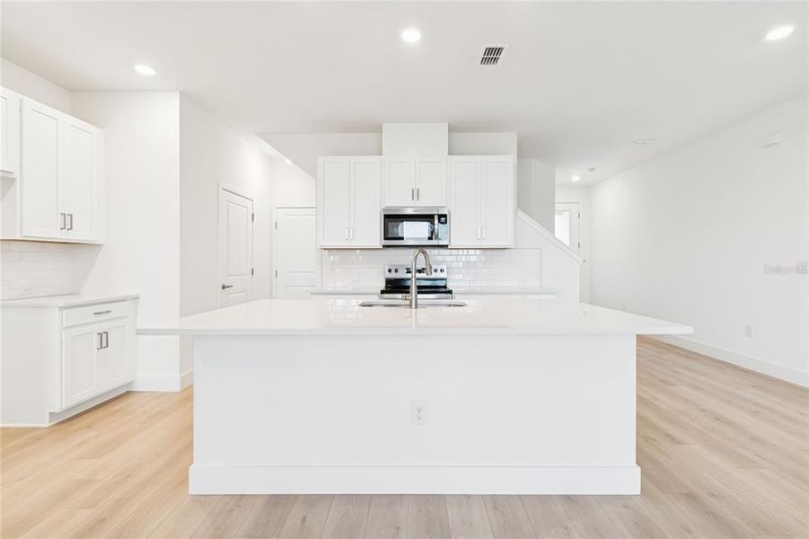 Furnished interior view inside a new home in North River Ranch – Townhomes, Parrish (Image 8).