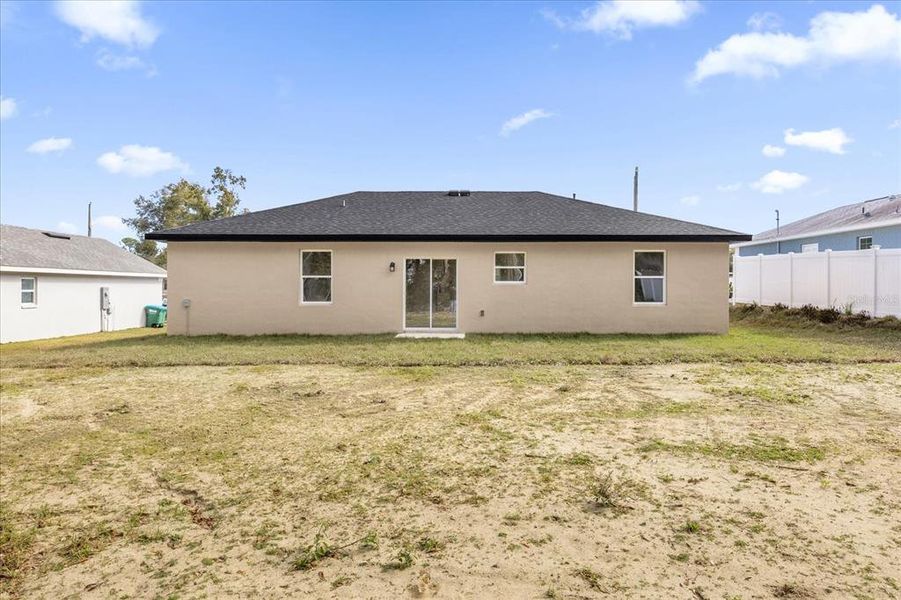 Exterior details and patio area of a home in , Summerfield (Image 3).