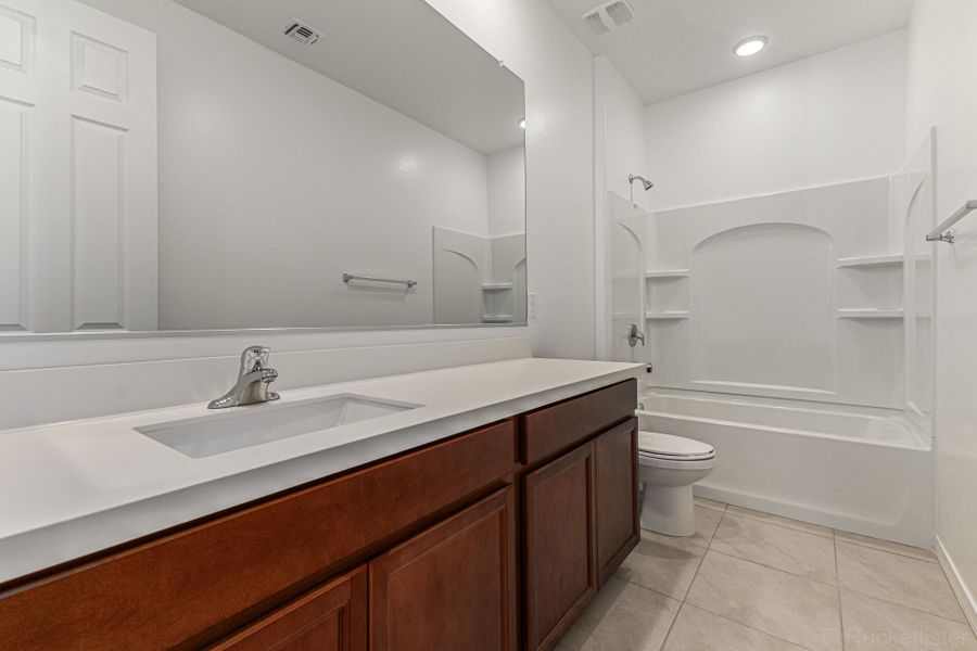 Furnished interior view inside a new home in Empire Pointe, Queen Creek (Image 6).