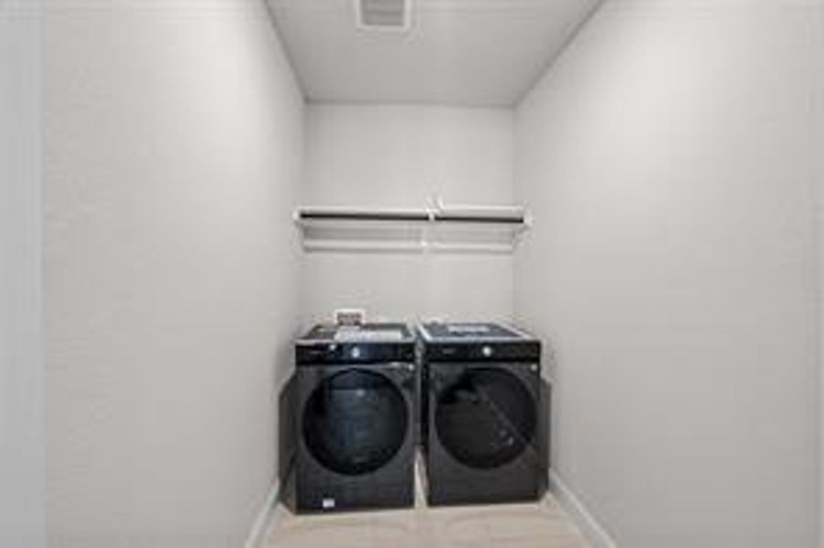 Laundry room with independent washer and dryer