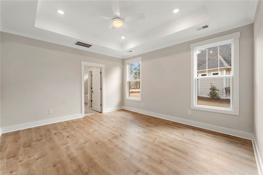 This carpeted space offers practical storage solut