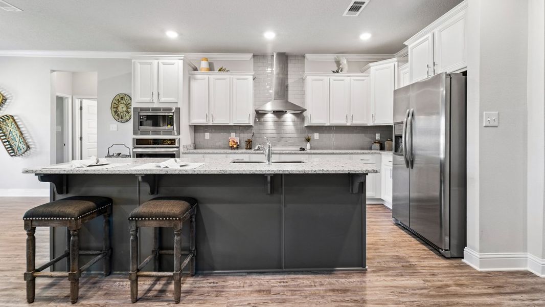 Representative furnished interior of a home built from the The McKenzie by D.R. Horton in Fallschase, Tallahassee (Image 7).