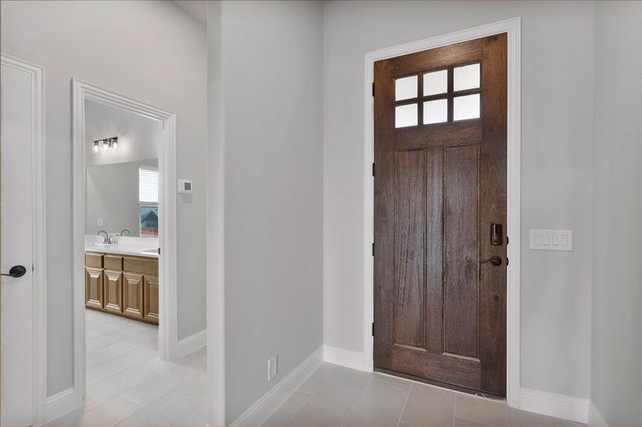 Entry with 8ft door & hallway to second bath