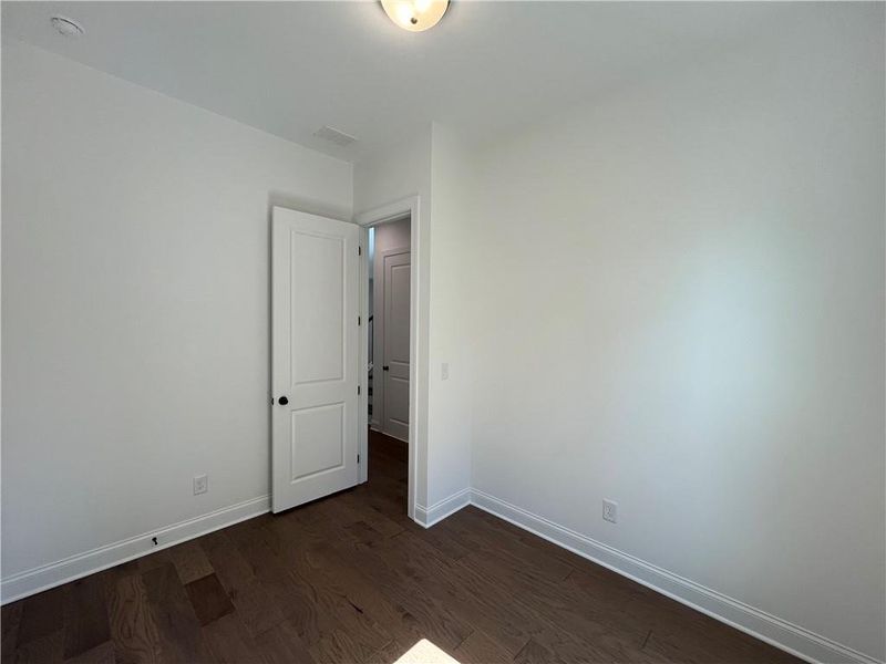 Spacious, unfurnished interior of a new home in East Harbor II at Chestatee, Dawsonville (Image 23).