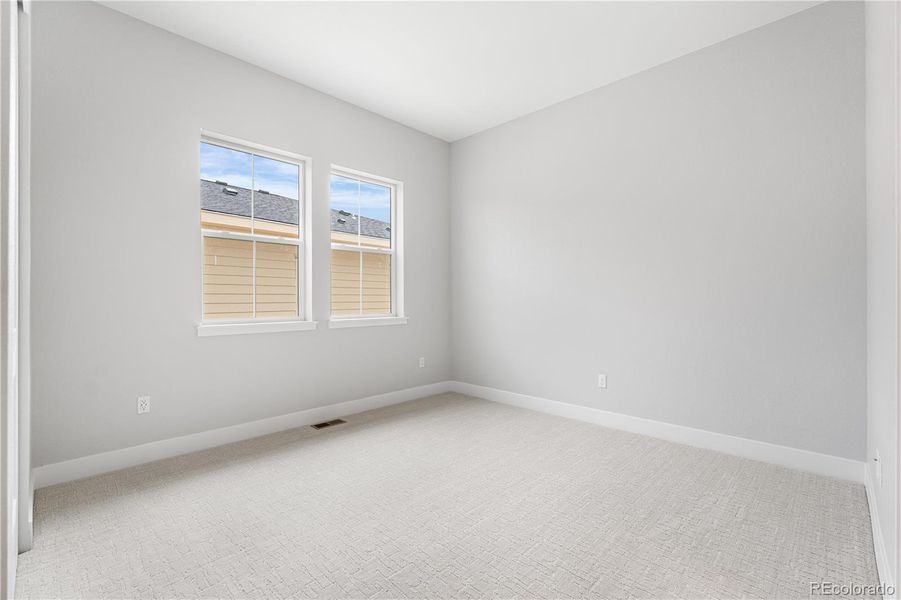 Spacious, unfurnished interior of a new home in Retreat at The Canyons, Castle Pines (Image 29).