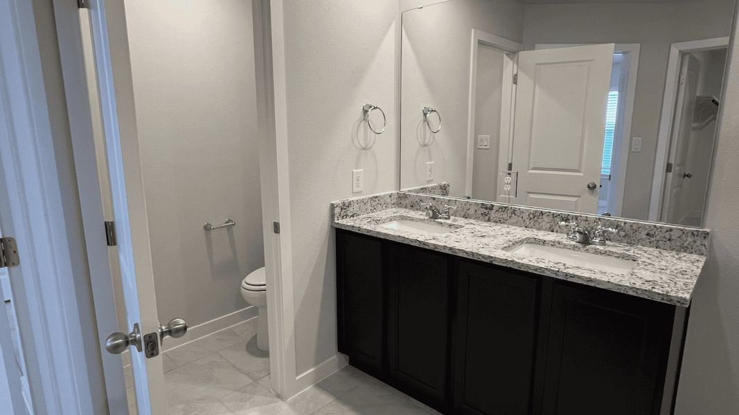 Furnished interior view inside a new home in Saratoga Crossing, Corpus Christi (Image 8).