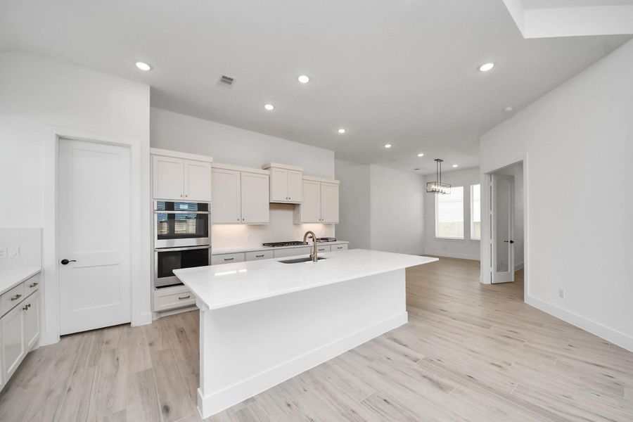 Furnished interior view inside a new home in Meridiana Courtyard Collection, Manvel (Image 9).