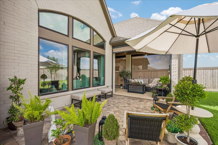 Exterior details and patio area of a home in Prairieland Village - Summit Collection, Cypress (Image 26).
