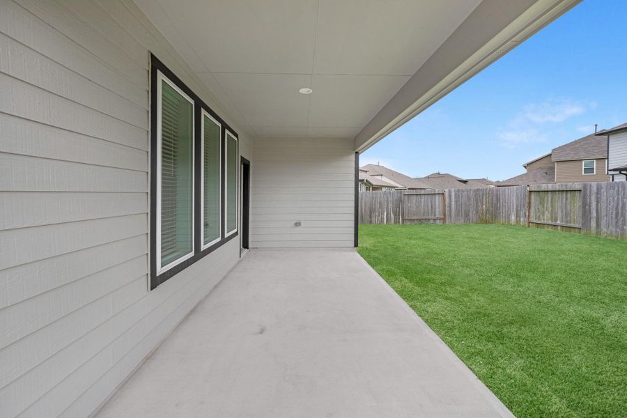 Exterior details and patio area of a home in Beacon Hill, Waller (Image 2). Exterior details and patio area of a home in Beacon Hill, Waller (Image 2).