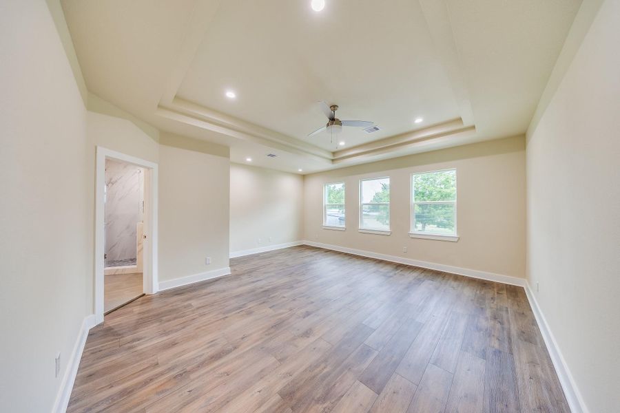 Bright and spacious primary bedroom, filled with natural light. Experience comfort and style today! Bright and spacious primary bedroom, filled with natural light. Experience comfort and style today!