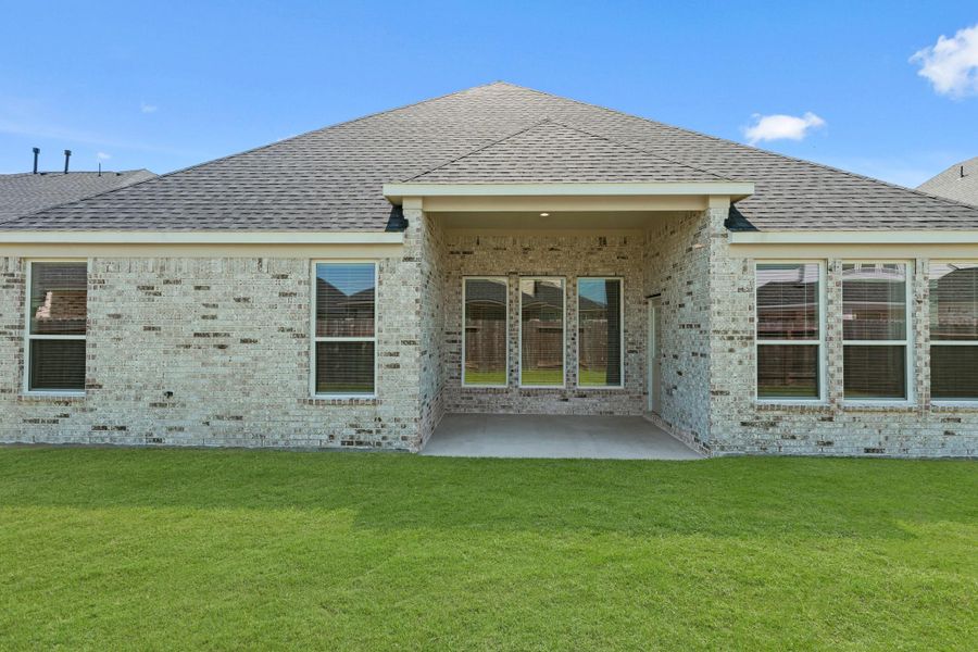 Front exterior of a new home in Briarwood Crossing, Rosenberg, TX, highlighting curb appeal (Image 22).