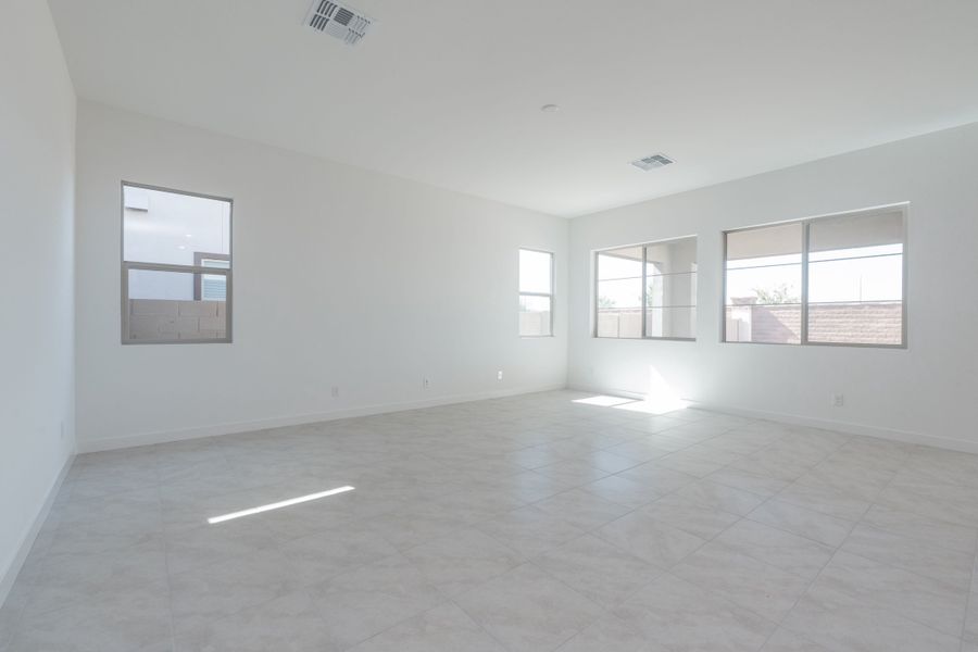 Spacious, unfurnished interior of a new home in Waterston Central, Gilbert (Image 7).