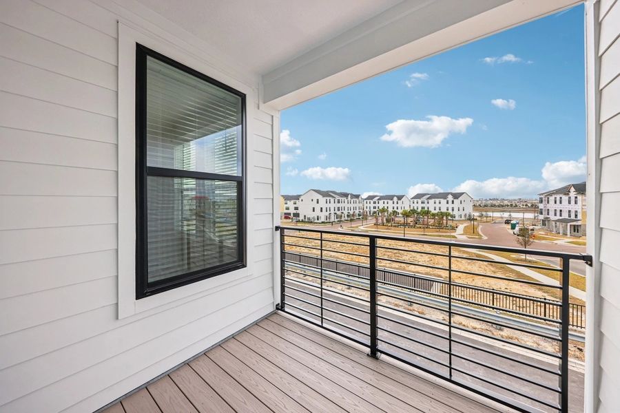 Exterior details and patio area of a home in Parkview at Hamlin, Winter Garden (Image 19).