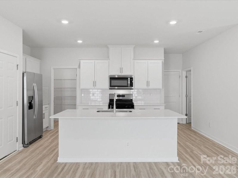 Furnished interior view inside a new home in Reedy Creek Preserve, Charlotte (Image 8).
