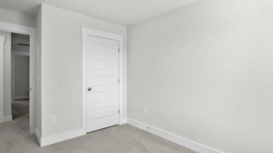 Spacious, unfurnished interior of a new home in The Townes at Cedar Hill Landing, Navassa (Image 24).
