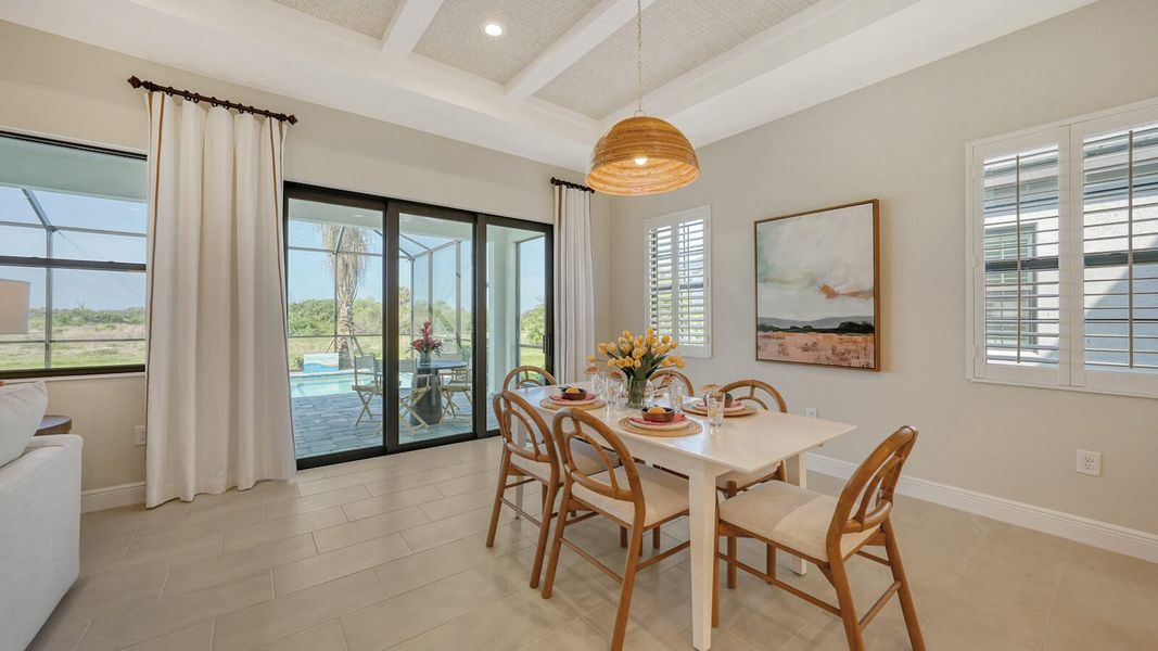 Furnished interior view inside a new home in SkySail Real Estate and Homes for Sale in Naples, FL - Neal Communities, Naples (Image 9).