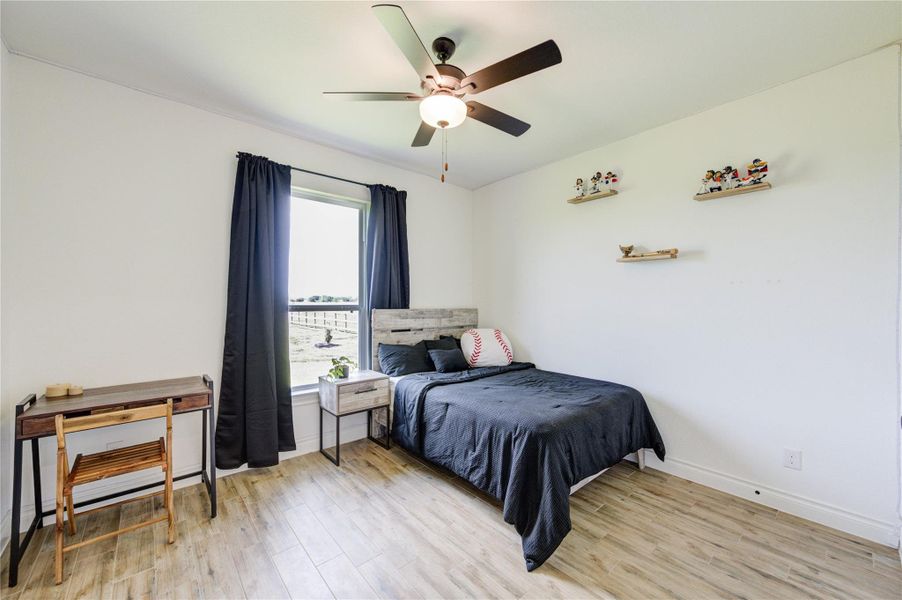 Inviting secondary bedroom offering plenty of space and versatility for any style or setup