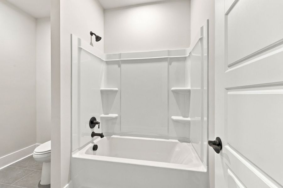 Furnished interior view inside a new home in Indigo Bay, Myrtle Beach (Image 18).