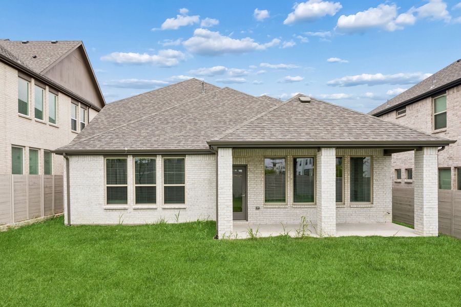 Exterior details and patio area of a home in Painted Tree Woodland West, McKinney (Image 4).