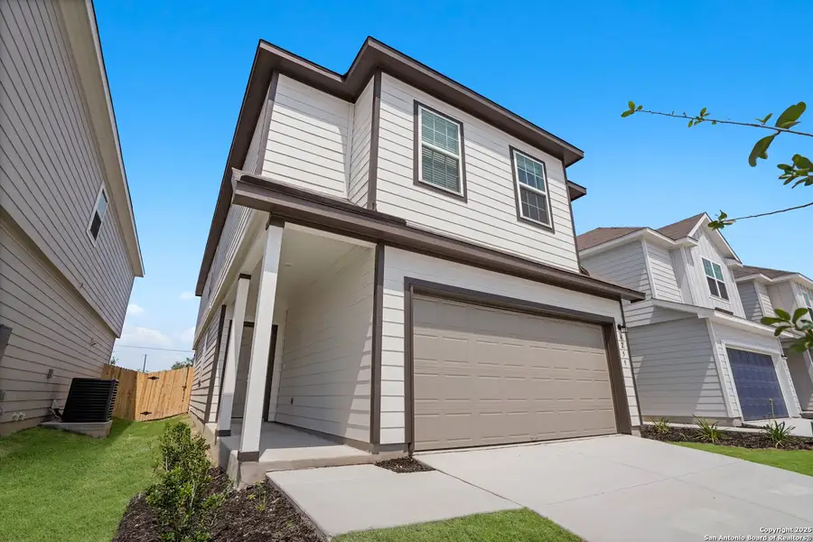 Front exterior of a new home in Melissa Ranch, San Antonio, TX, highlighting curb appeal (Image 10).
