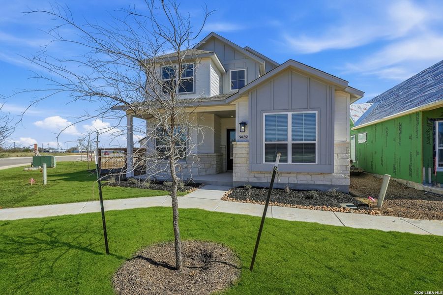 Front exterior of a new home in The Crossvine, Schertz, TX, highlighting curb appeal (Image 24).