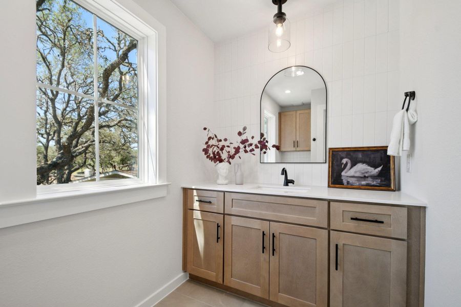 A well-appointed bathroom vanity with a spacious counter and ample storage provides functional elegance. A well-appointed bathroom vanity with a spacious counter and ample storage provides functional elegance.
