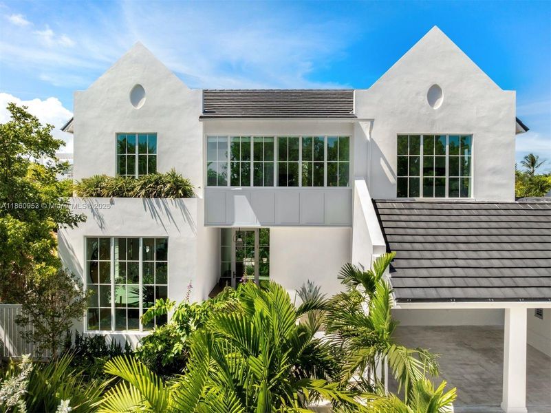 Front exterior of a new home in , Key Biscayne, FL, highlighting curb appeal (Image 19). Front exterior of a new home in , Key Biscayne, FL, highlighting curb appeal (Image 19).